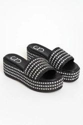 Klapki damskie skórzane na koturnach CESARE CASADEI