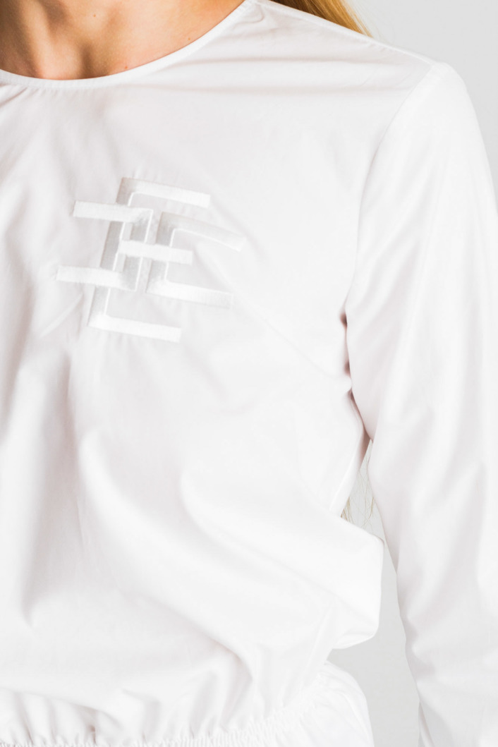 Biała bluzka Elisabetta Franchi z falbaną