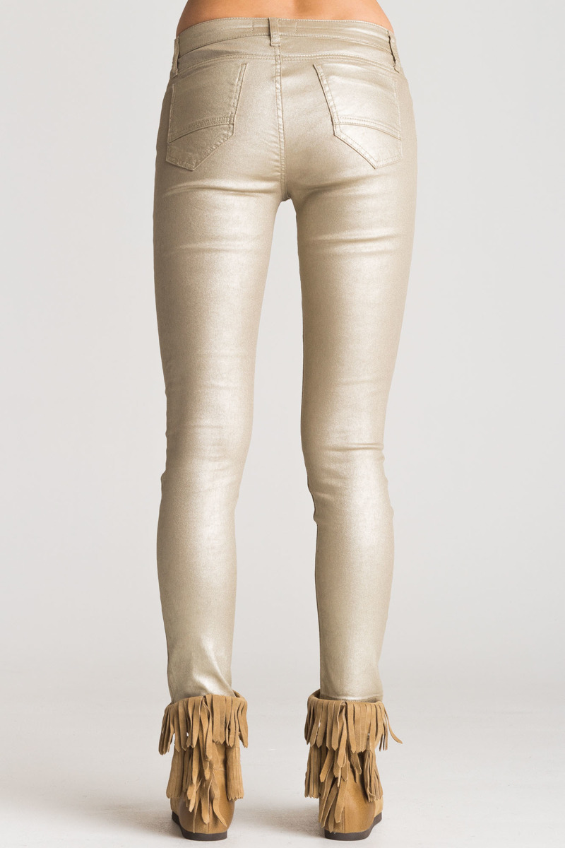 Złote jeansy damskie z połyskiem 